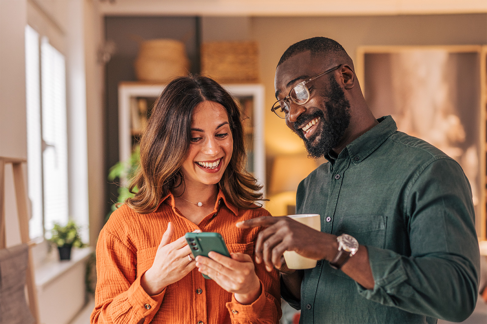 two people looking at their phones